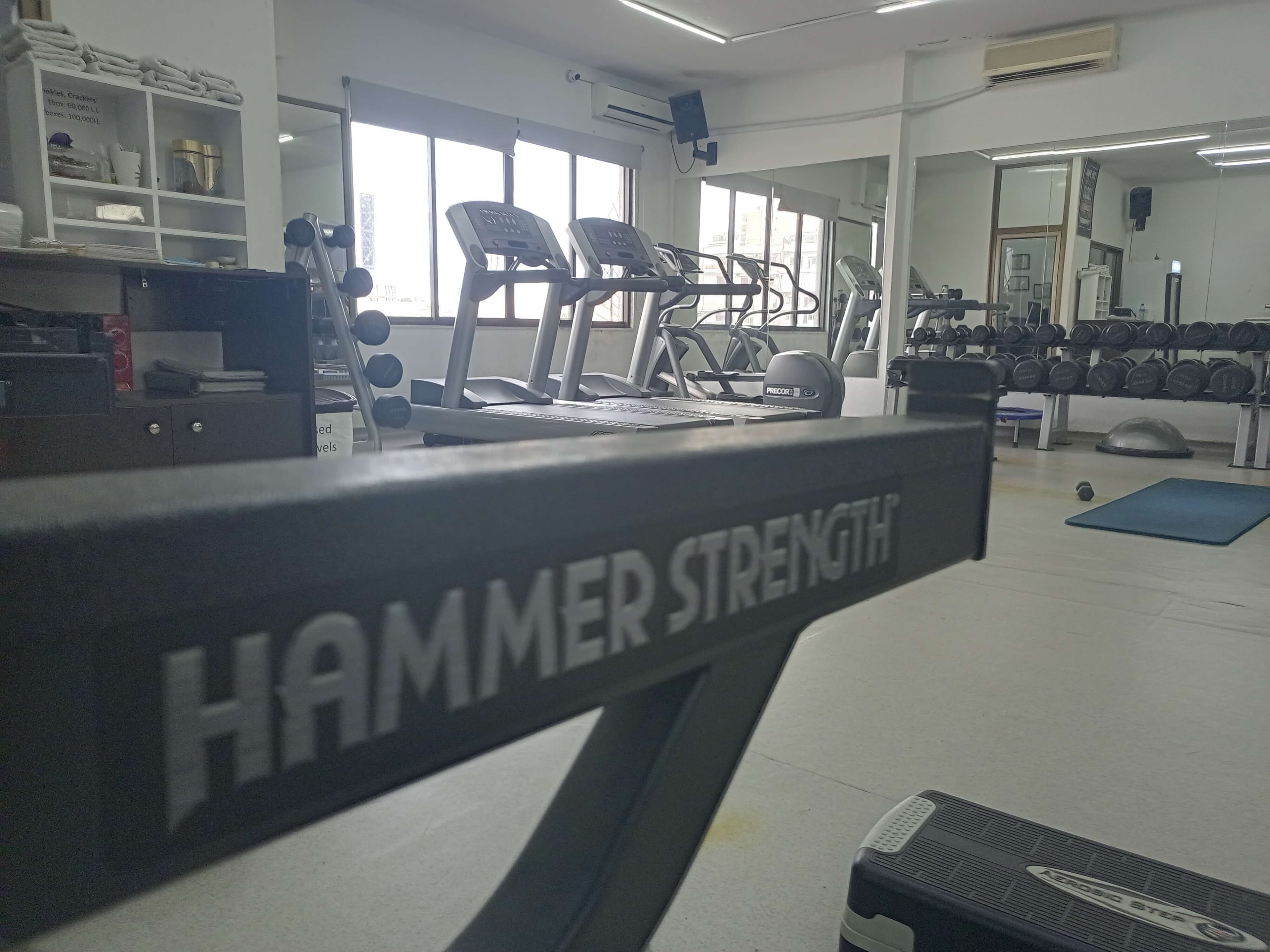 Personal trainer working with a client